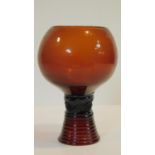 A 19th century large brown German blown glass rummer, the stem moulded with raspberry punts and