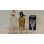 A collection of glassware. Including four antique shot glasses, a boxed Stuart crystal air twist