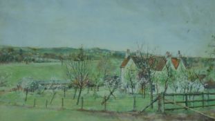 A 20th century framed and glazed watercolour, farmhouse in a landscape, unsigned. 66x46cm