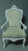 A large distressed painted Louis XV style throne chair in calico upholstery. H.124cm
