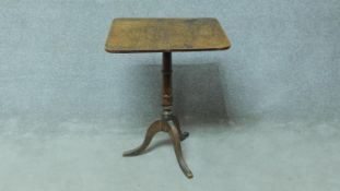 A 19th century oak tilt top occasional table on tripod cabriole supports. H.71 W.56 D.49cm
