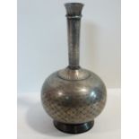 A 19th century Persian white metal inlaid Bidri Ware bottle vase with a stylised floral, foliate and