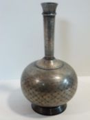 A 19th century Persian white metal inlaid Bidri Ware bottle vase with a stylised floral, foliate and