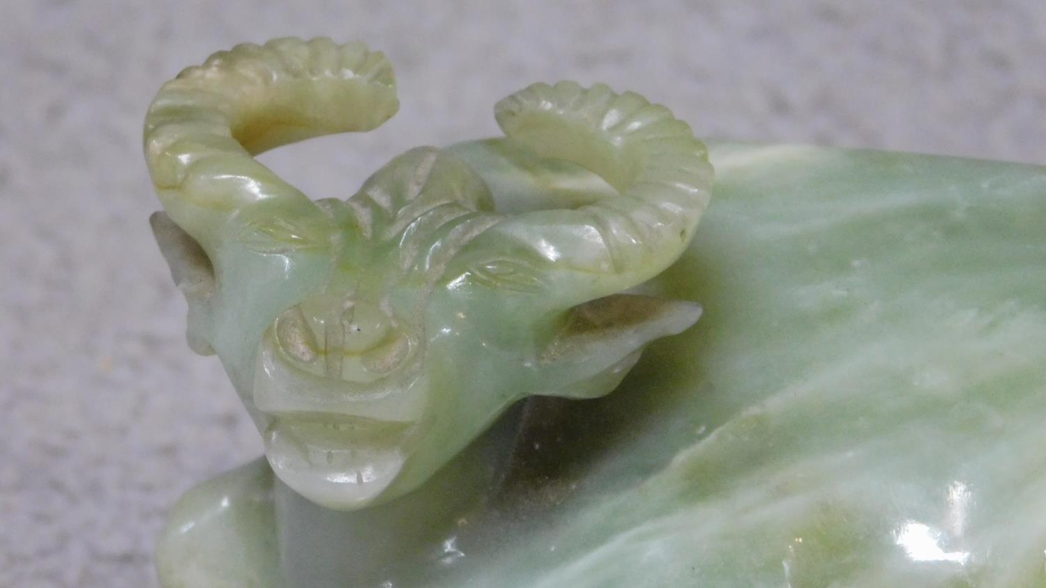 A 20th century Chinese carved serpentine jade water buffalo on a footed pierced carved hardwood - Image 3 of 8