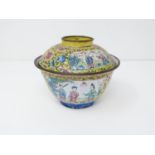 A late Qing Canton enamel lidded tea bowl. Decorated with Chinese figures and flowers on an imperial