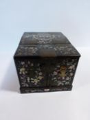 A 19th century Chinese rosewood travelling vanity box decorated with inlaid mother of pearl figures,