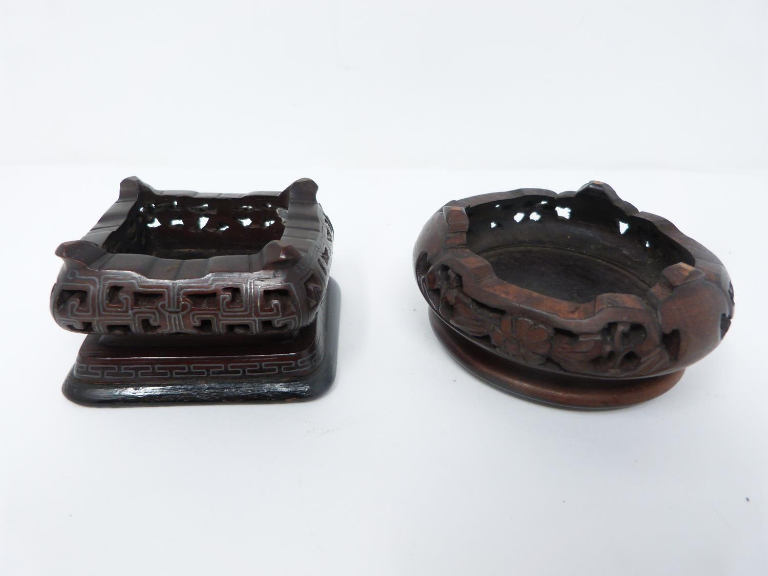 A collection of Chinese carved and pierced hardwood display stands. d16.5cm - Image 6 of 8