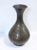 A large Eastern repousse brass vase, decorated with Jewish and Arabic calligraphy, figures and