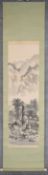 A Japanese mounted scroll, watercolour on paper, figure on a bridge in a village landscape, red