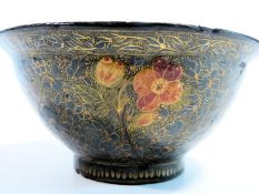 A mid to late 19th century gold painted lacquered paper mache Kashmiri bowl of hemispherical shape