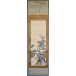 A Japanese mounted scroll, watercolour on paper, storks in flight and among trees, signed, with