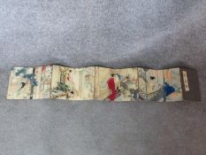 An early 20th century hard back Japanese erotic scene fold out hand painted and coloured book.