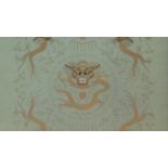 A framed 20th century Chinese silk padded embroidery with golden thread. There is a central dragon