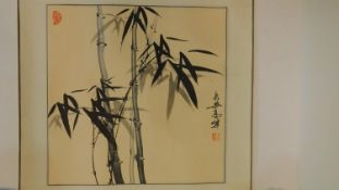 A 20th century Chinese bamboo ink painting on paper with inscription and artist's seal mark. 43x43