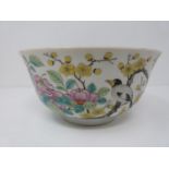 A Guangzhou period Chinese porcelain footed bowl decorated with song birds and yellow prunus blossom