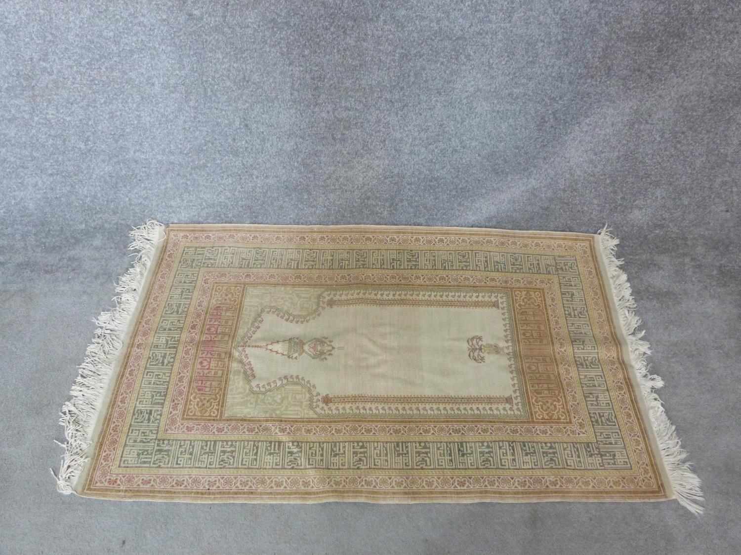 A woven Turkish prayer rug with Mehrab and lamp, mosque and calligraphy border design. 154x88 - Image 8 of 9