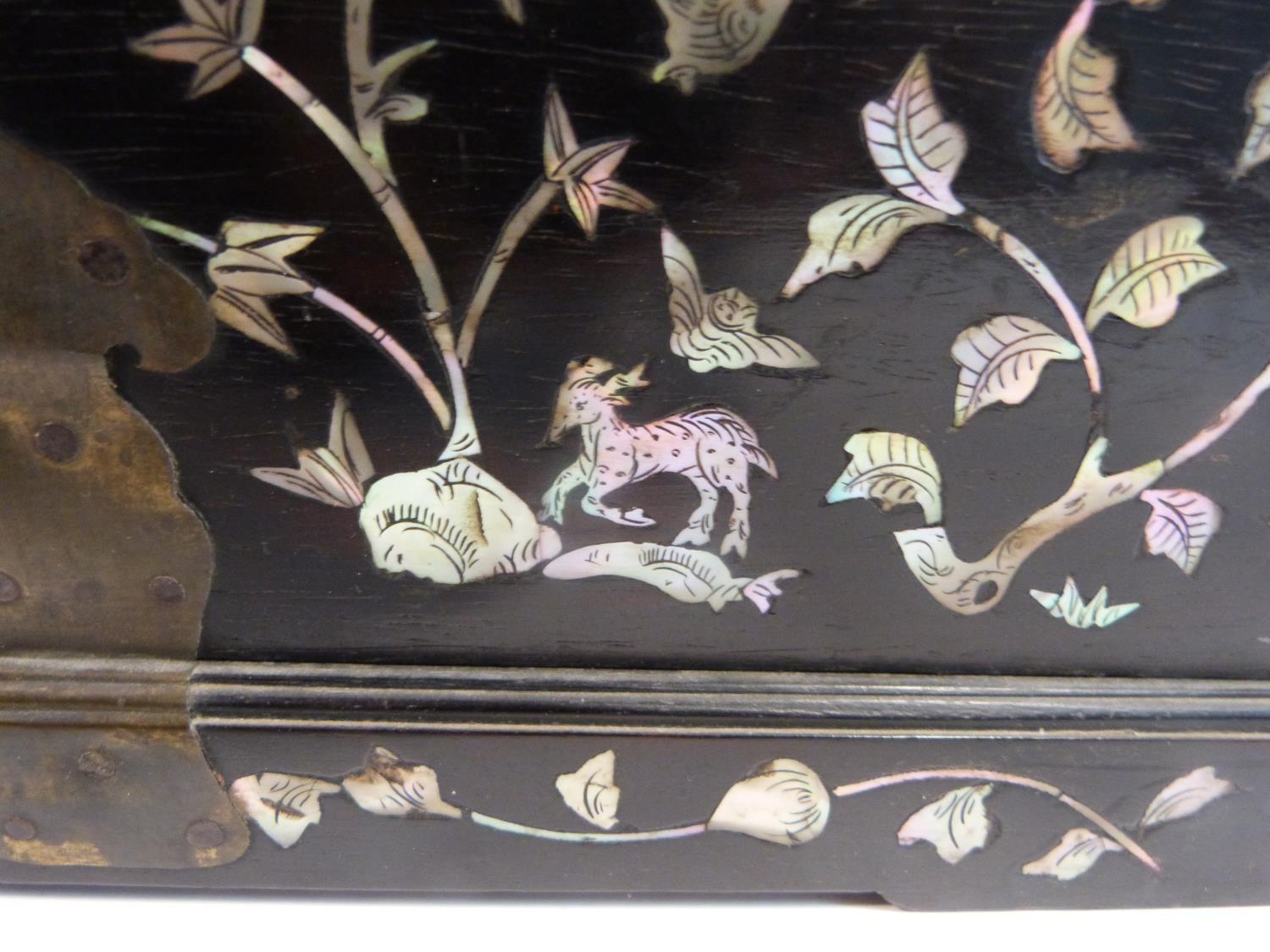 A 19th century Chinese rosewood travelling vanity box decorated with inlaid mother of pearl figures, - Image 21 of 22