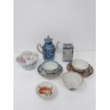 A collection of Qing dynasty Chinese porcelain items. Including a blue and white tea pot with