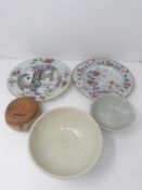 A collection of Qing dynasty Chinese porcelain. Including a ceramic unglazed coin box, a Famille