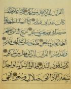 A portfolio containing thirteen double sided Islamic Quran callighraphy pages, with gilded