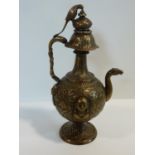 A 19th century Indian repousse design brass samovar. The finial of the hinged lid in the form of a