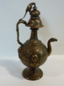 A 19th century Indian repousse design brass samovar. The finial of the hinged lid in the form of a