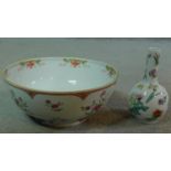 A Chinese 18th century porcelain Famille Rose bowl with floral spray decoration along with a 20th