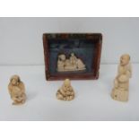 Four Japanese and Chinese carved ivory netsuke, one in a glass fronted silk lined case and one