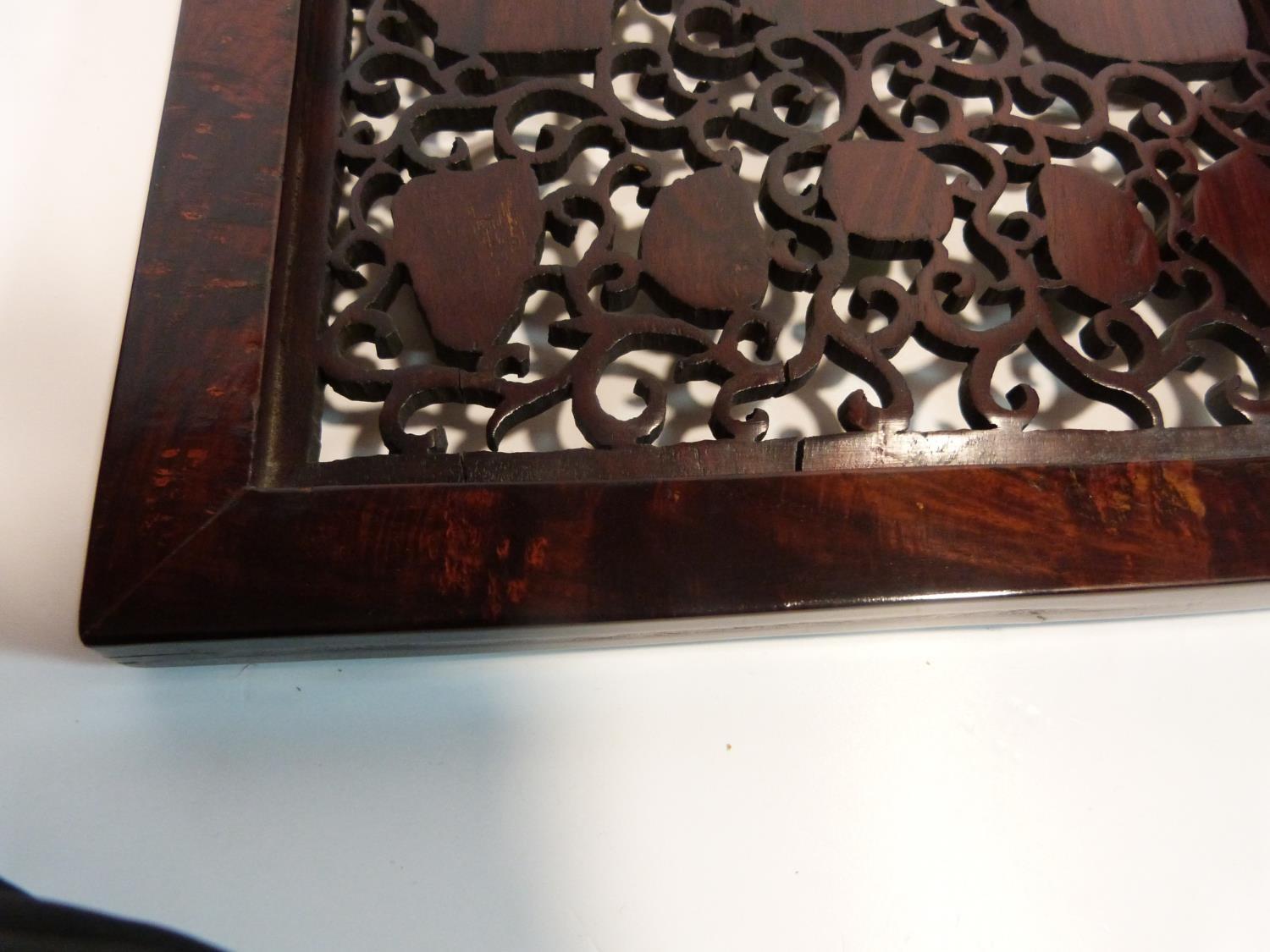 A Qing dynasty Chinese carved and pierced hardwood table screen and geometric stand. The screen is - Image 20 of 24