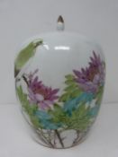A Qing dynasty Chinese hand painted porcelain lidded dowry jar decorated with water lilies, a