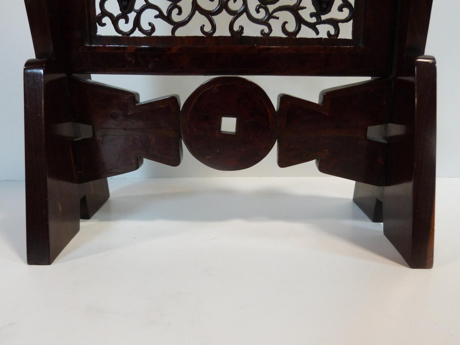 A Qing dynasty Chinese carved and pierced hardwood table screen and geometric stand. The screen is - Image 2 of 24