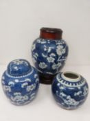 A collection of Republic Chinese blue and white porcelain prunus blossom design ginger jars, two