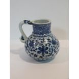A Chinese blue and white ?Islamic market? pattern porcelain jug/tankard with dragon form handle