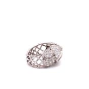 A 1950's Cartier Cocktail Ring, Cartier baguette and brilliant cut pave set dome top bombe ring