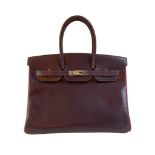 A Raisin & Cyclamen Hermes Birkin in box leather with palladium hardware with dustbag, key, lock and