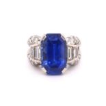 A 1950s Vintage sapphire and diamond ring mounted in platinum. French. Circa 1960. The central