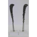 A pair of miniature Ashanti bronze swords with sculpted fish and scorpion motifs. Mounted on