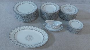 A limited edition Limoges Tiffany and Co 'Century' pattern part dinner service for 13 people.