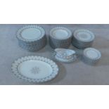 A limited edition Limoges Tiffany and Co 'Century' pattern part dinner service for 13 people.