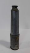 An antique Ross of London brass four draw extendable telescope. Stamped Ross London.