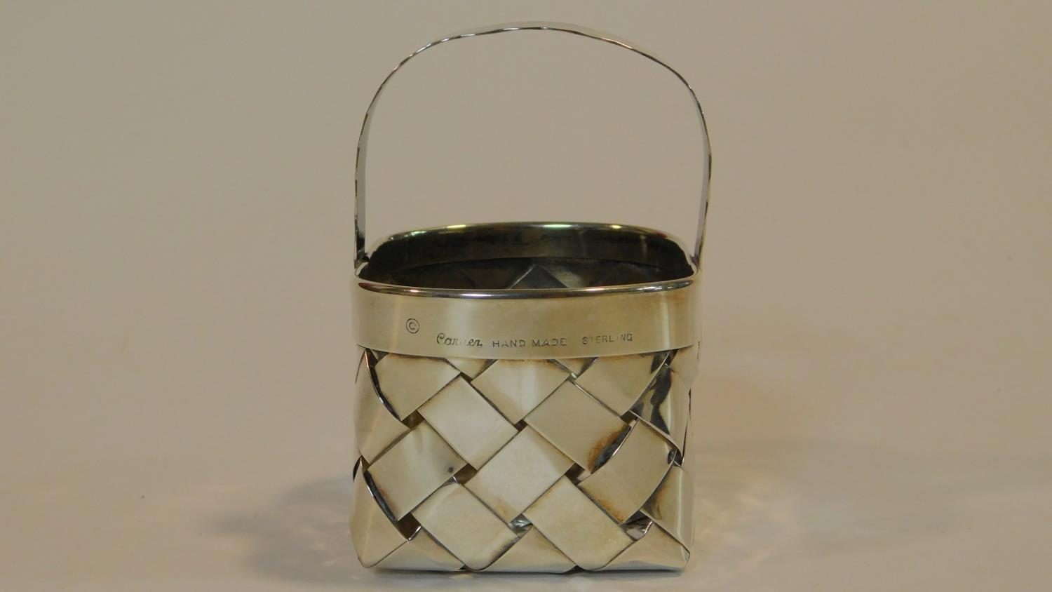 A Cartier silver basket of oval woven form with a scalloped edged handle, end marked to the side - Image 3 of 6