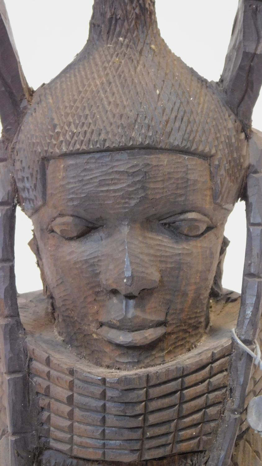 A Nigerian Benin carved wooden bust of a female warrior with neck rings and tribal headress. H.36cm - Image 2 of 5