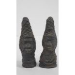Two miniature Benin bronze heads of Queen of Ife. Sculpted with conical head dresses and neck rings.