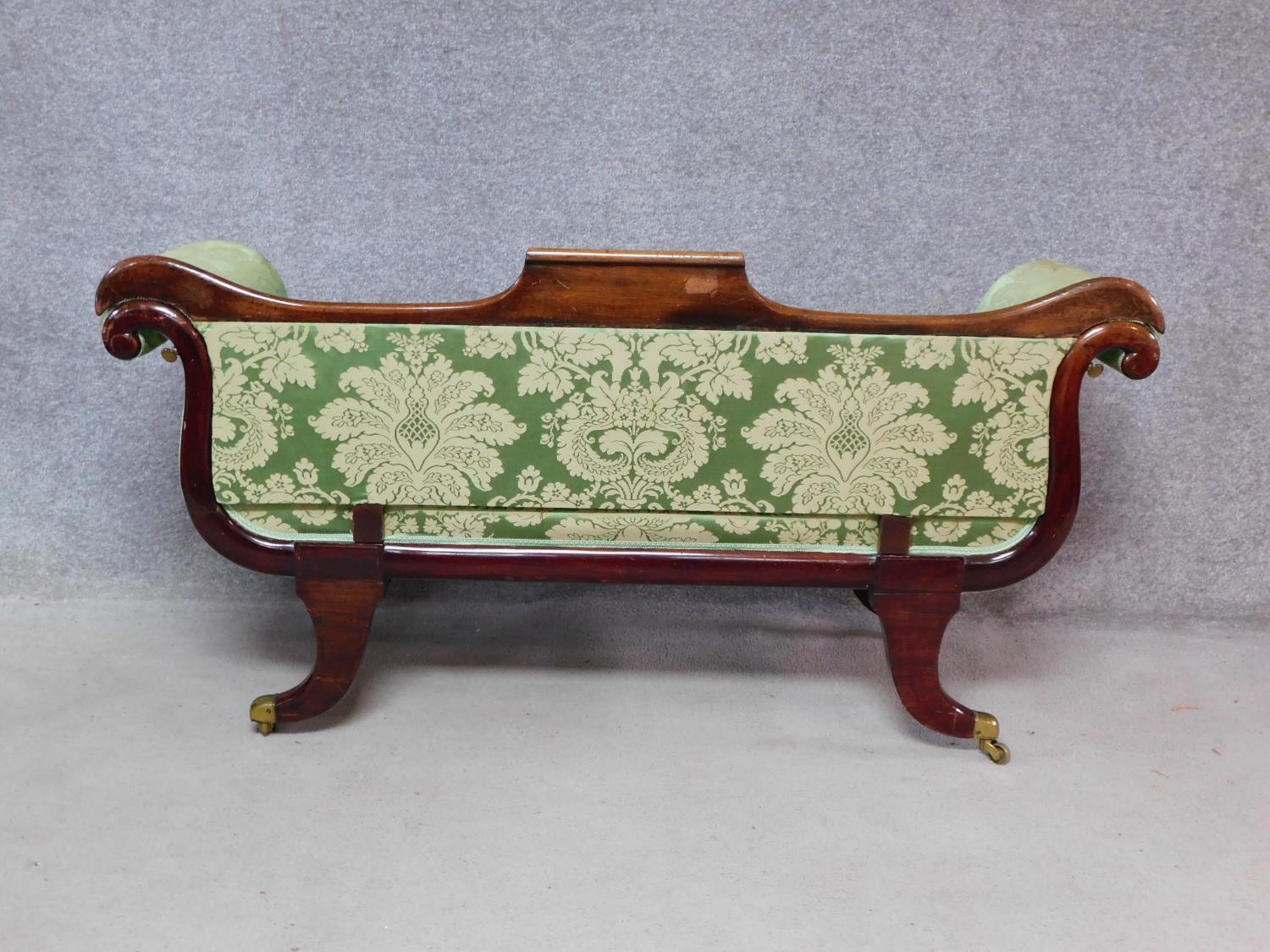 A small Regency mahogany framed scroll arm sofa in newly upholstered emerald floral damask raised on - Image 4 of 5