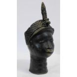 A Benin bronze Ife head of the King of Oba. With plaited crown and floral detailing. H.44cm