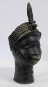 A Benin bronze Ife head of the King of Oba. With plaited crown and floral detailing. H.44cm