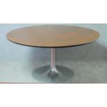 A Maurice Burke design for Arkana rosewood dining table on "Tulip" base the filled brushed aluminium