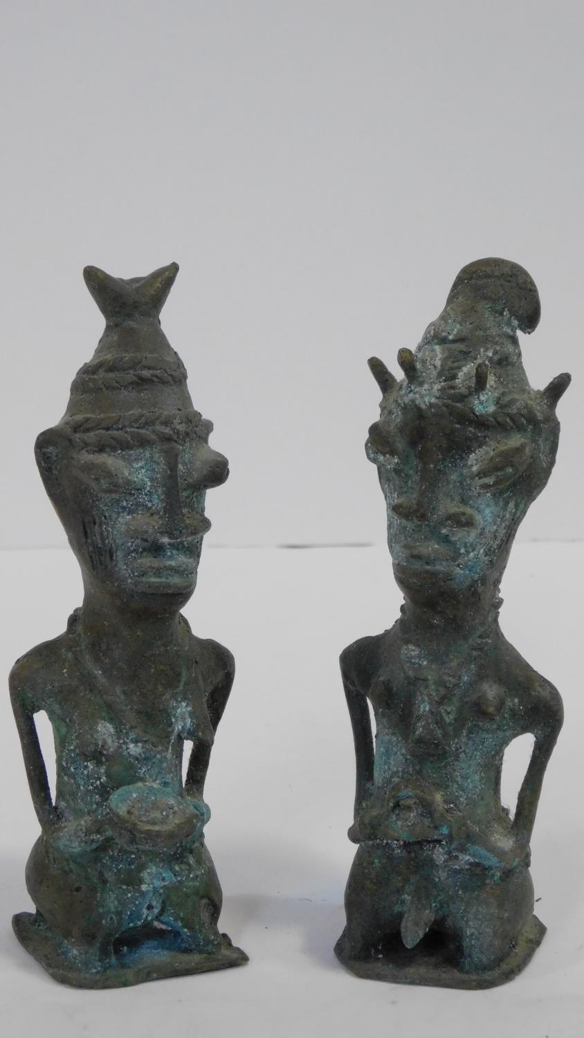 Two Ashanti bronze seated figures with tribal head dresses. H.15cm