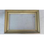 A large 19th century giltwood and gesso gallery sized picture frame. 110x160cm