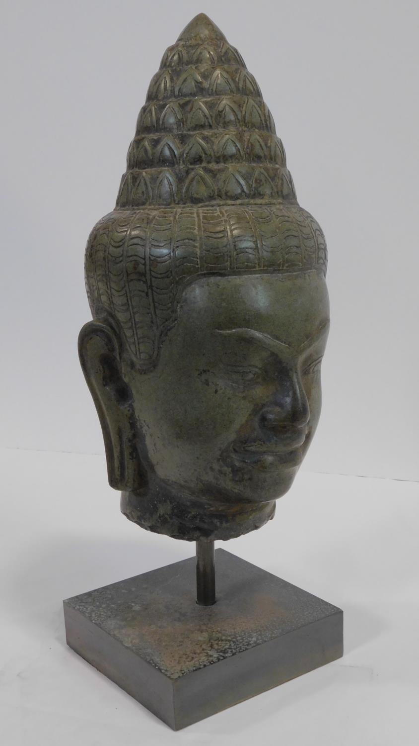 A Southeast Asian carved hardstone head of Vishnu with serene face, open eyes, elongated earlobes, - Image 2 of 6